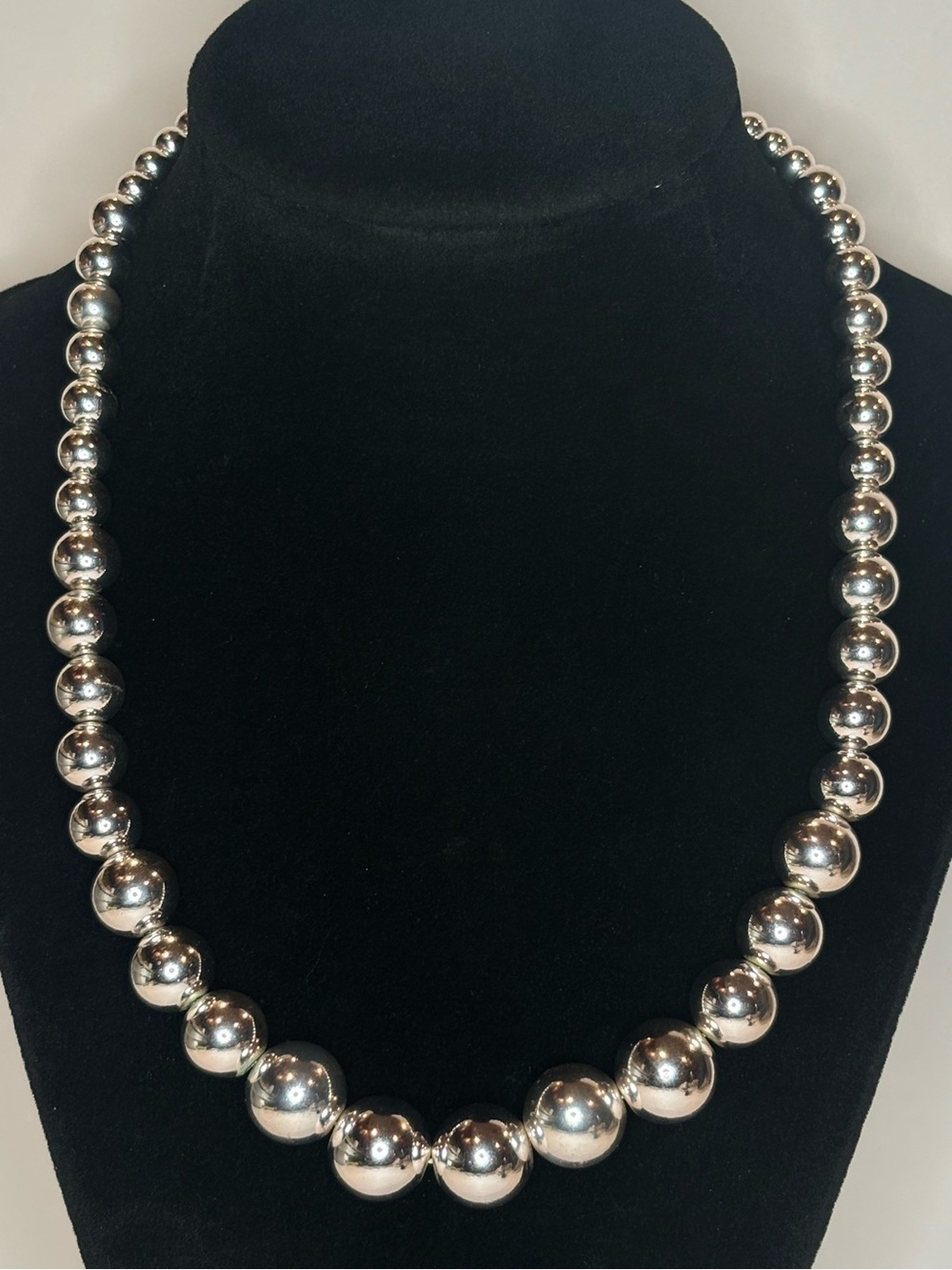 Monet Graduated Metallic Bead Necklace 21.5” Signed Charm Adjustable